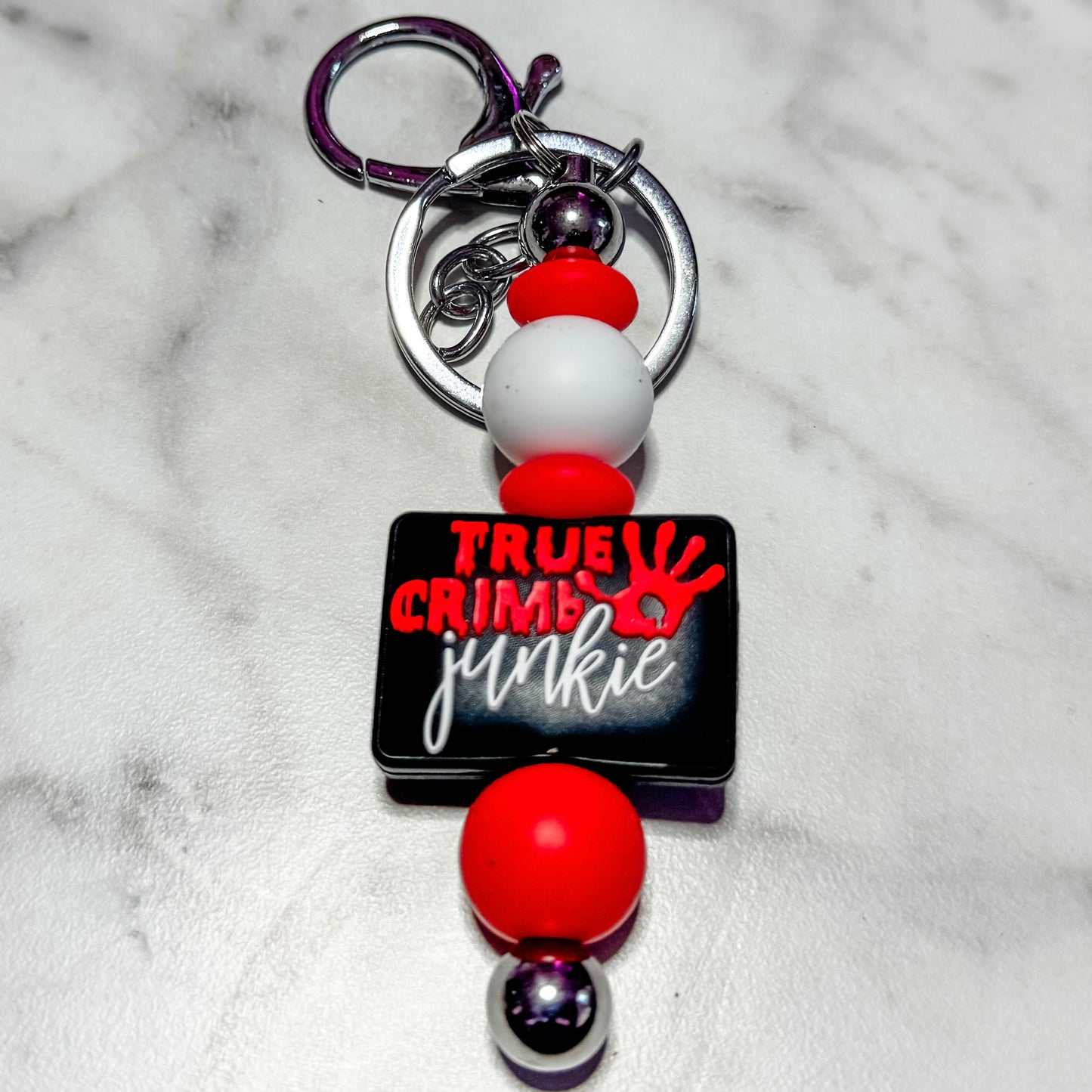 True Crime Junkie keychain