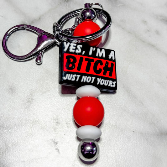 Just Not Yours keychain